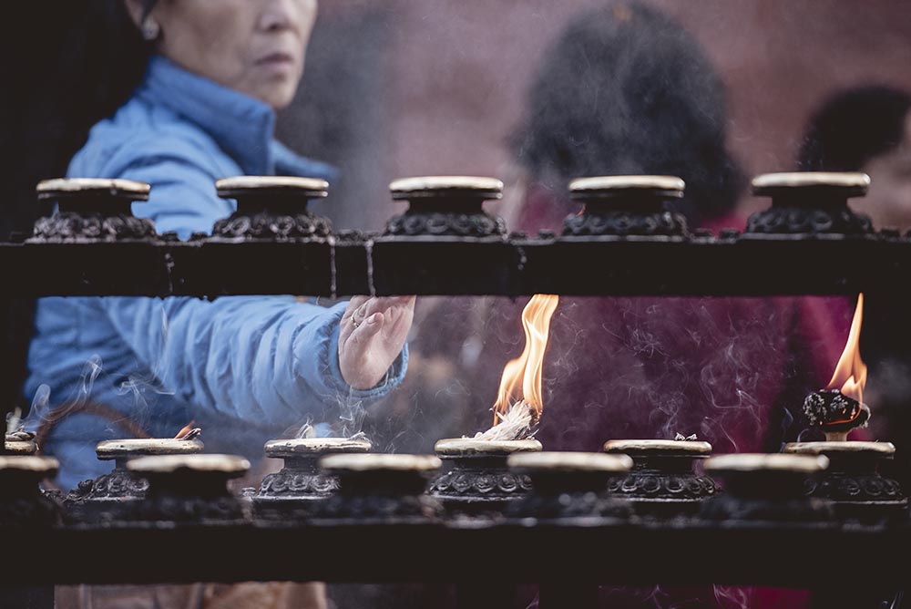 closeup shot of people burning sage with a blurred 2023 03 09 01 16 19 utc